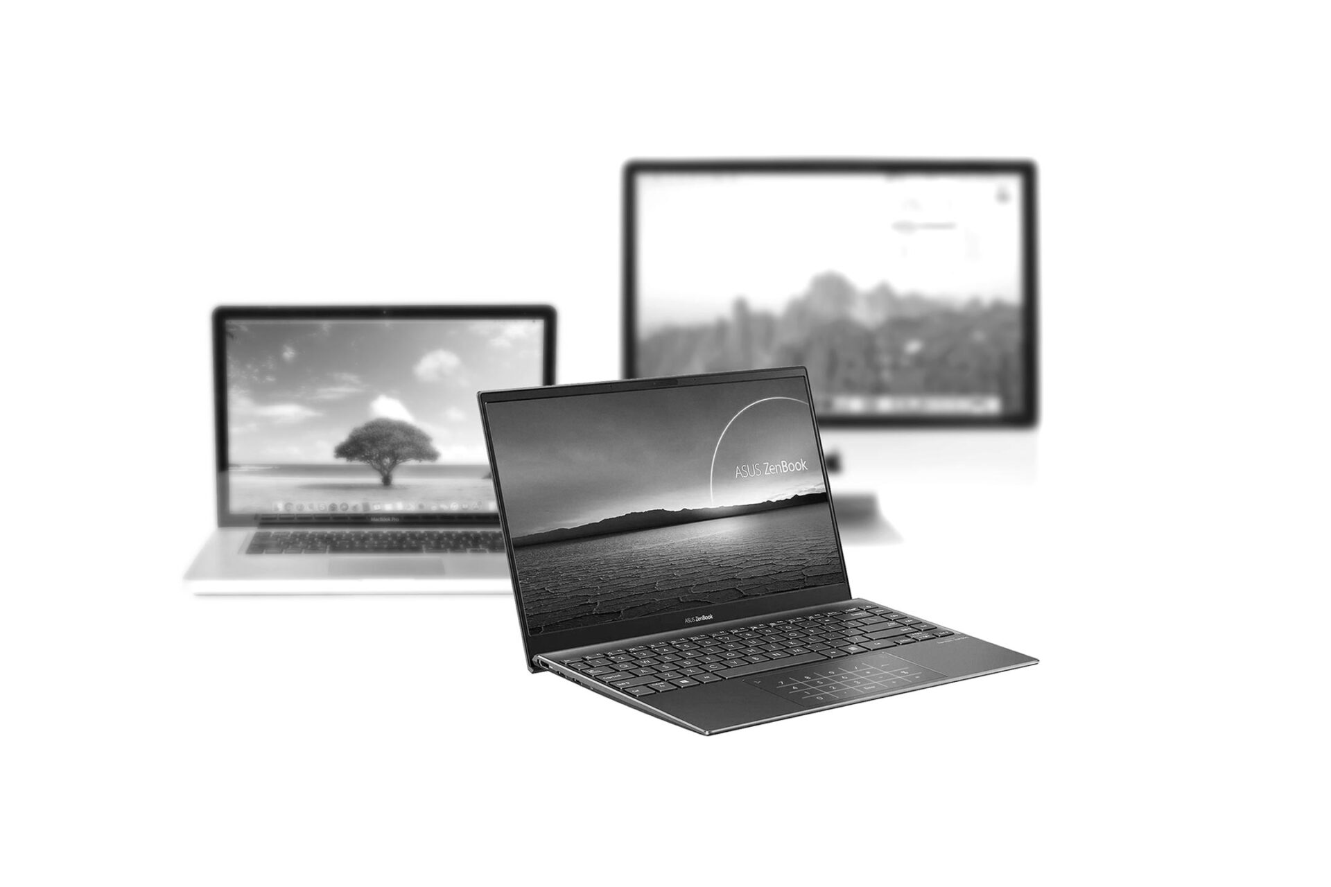 Photo montage of Asus laptop in front and blurred Macbook Pro and iMac in the background.